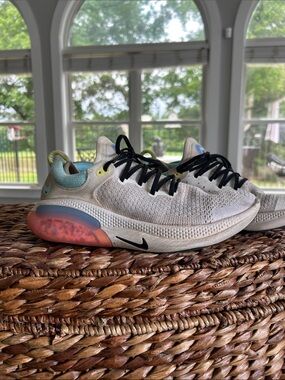 Nike  women’s Joyride Run, Sneakers with Light Blue and light orange